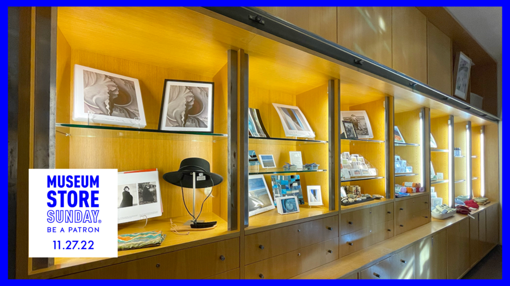 Image of cases with objects like a Gaucho Hat, books and art prints of O'Keeffe's work are showcased at the Georgia O'Keeffe Museum Store