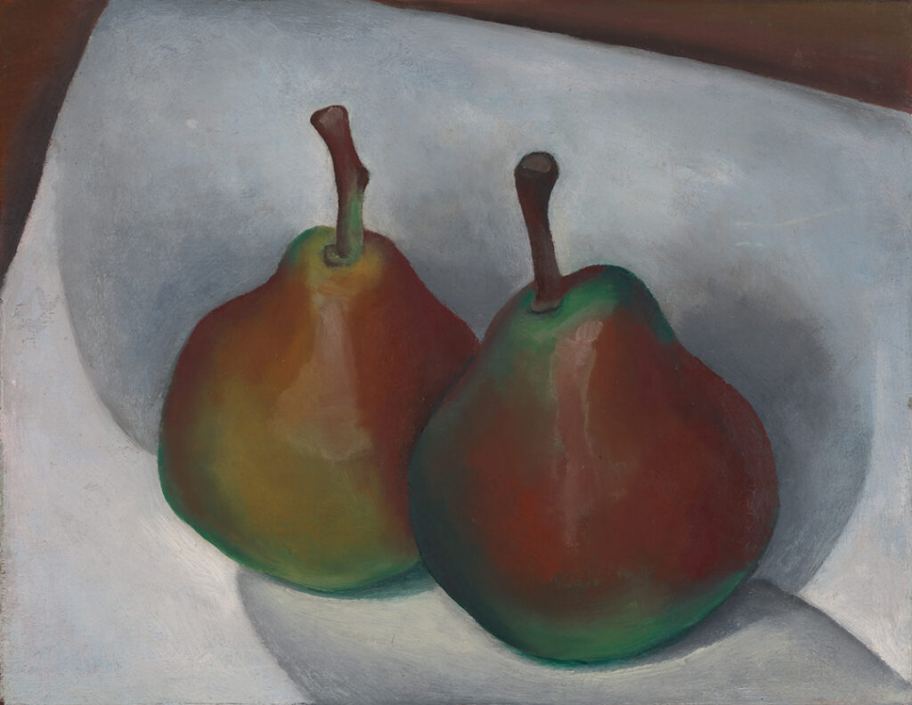Small horizontal canvas with two pears. The one on the left is golden greenish and the other on the right is reddish and darker green, placed on a white ground with shadows. The left pear is placed just slightly behind the right one.