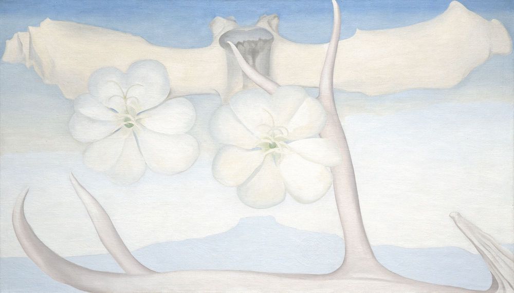 Large horizontal painting of blue and grey tones. Along the bottom in the foreground lies a bleached antler with arms reaching upward towards the sky. Floating along the top spanning the length of the canvas is a vertebral bone. Superimposed over this in the middle are two white flowers, hovering just above a blue silhouette of the Pedernal.
