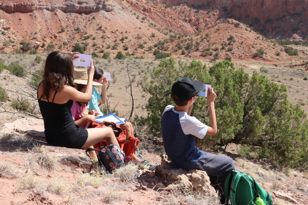 Students of the O’Keeffe Art and Leadership Program at the Georgia O’Keeffe Museum on a field trip to Ghost Ranch in 2022.