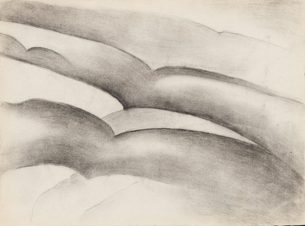 Landscape sketch overall of hills on paper.