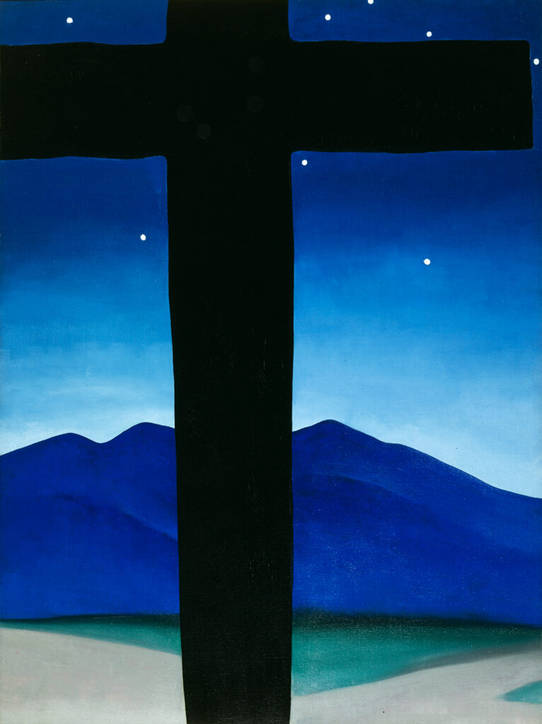 Vertical painting with a large black cross spanning the surface of the picture plane with a massive cross beam running across the upper quadrant and the base stem running the vertical length of the painting. The cross is slightly off center to the viewers left. Looming behind the cross is a rolling mountain range of deep blues hues. Soft white light illuminates the edge of mountain tops and rises into a glorious gradation of of turquoise and blue sky, dotted with white circular stars.