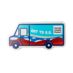 A magnet in the shape and with a colorful illustration of the Art to G.O. truck
