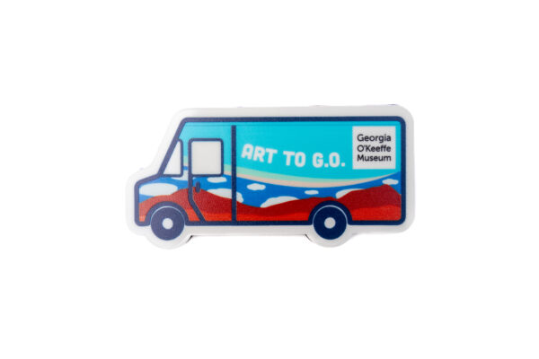 A magnet in the shape and with a colorful illustration of the Art to G.O. truck