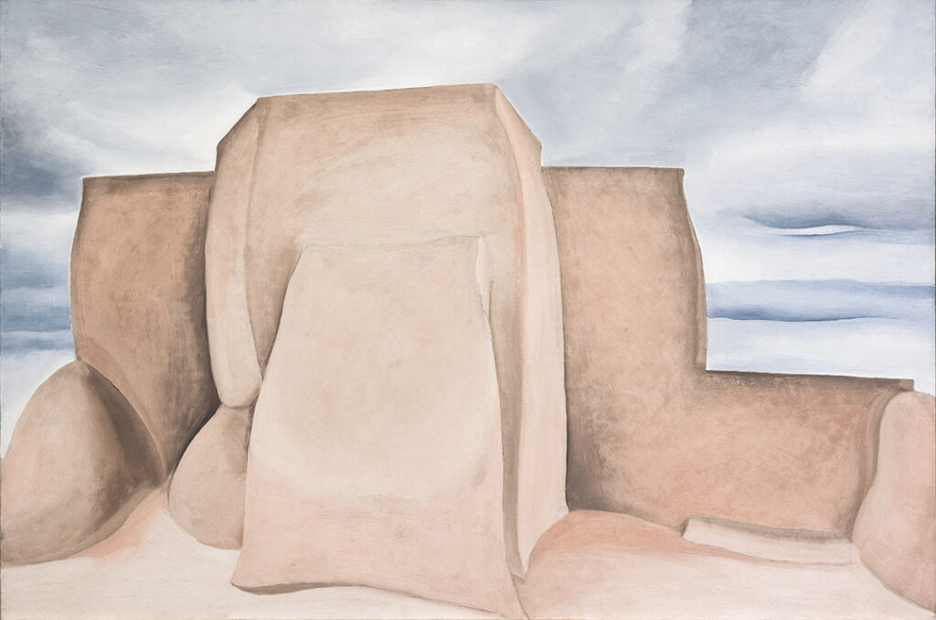 Painting of the church from the rear, a vantage point that allowed O'Keeffe to explore the blocky, geometric qualities of its adobe walls. Enlarging and exaggerating these forms, she portrayed the church as if it were an organic growth emerging from the earth.