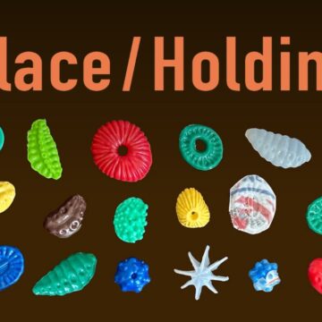Place/Holding in text with molded organic figures created with recycled plastic in different colors underneath.