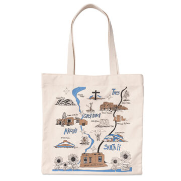 A tote bag with New Mexico locations significant in O'Keeffe's life and work illustrated in blue and brown.