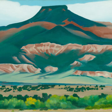 Oil painting of Pedernal in fall, predominantly in dark greens and oranges with brush in foreground.