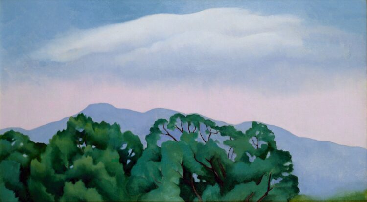 Bright green trees poke up from the bottom of the composition. Behind the trees, a blue mountain fades into the distance. The sky above is a soft gradient of pale blue and pink.